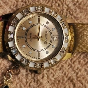 Gold tone watch